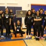 Black Student Union organizers pose for a picture at Rainier Beach High School's Black Excellence Fair