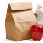 Lunch sack with apple and water