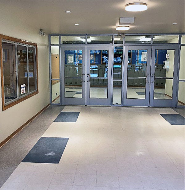 Interior doors with a window next to them