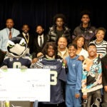 Group photo of AAMA Students and Dr. Mia Williams after being awarded the Changemaker Award