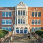 Cover of Building for Learning, SPS Histories, 1862-2022, Garfield high school building exterior in background