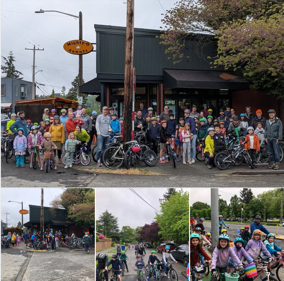 Green Lake Elementary students and family members pose with bikes in front of Mighty O Donuts and on street.
