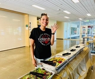 Photo of woman serving food