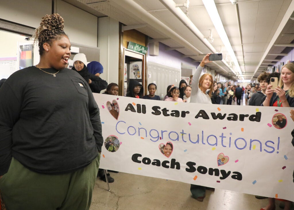 All Star Sonya Glaspy with congratulation sign