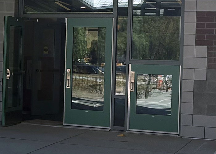 a double door next to a short door
