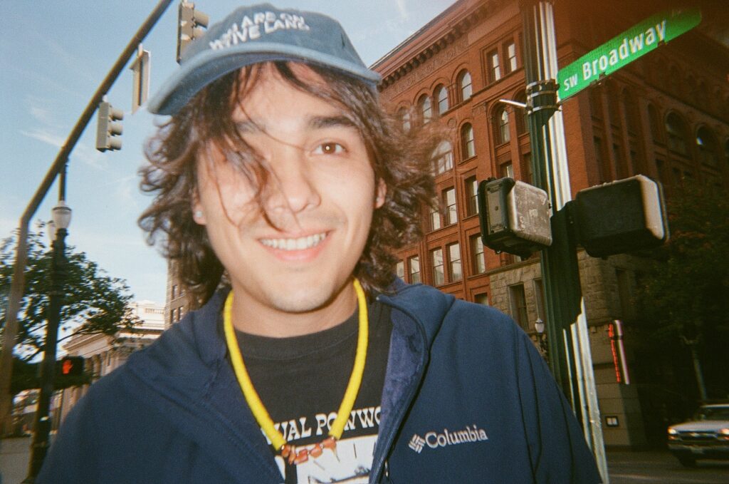 Picture of young man in baseball hat