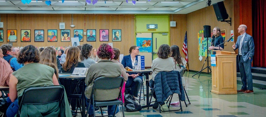 Superintendent Shuldiner speaking to the community during the community meeting at Salmon Bay