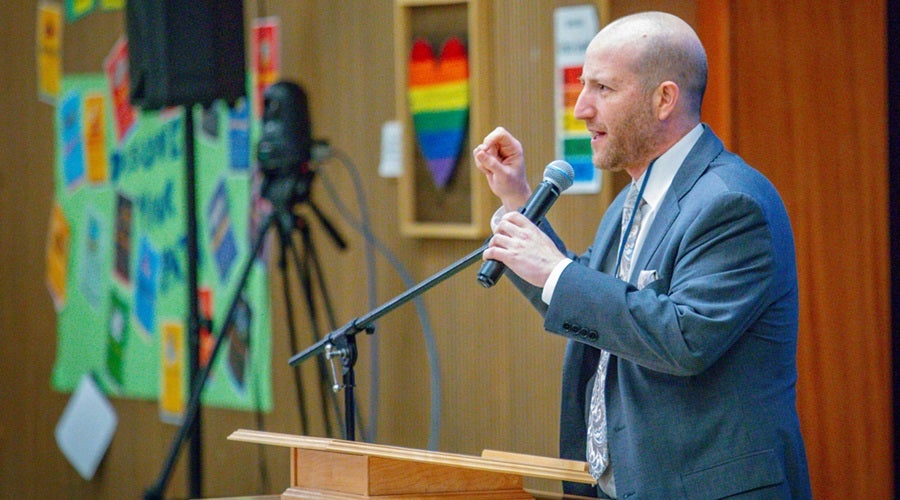 Superintendent Shuldiner speaking to the community during the community meeting at Salmon Bay