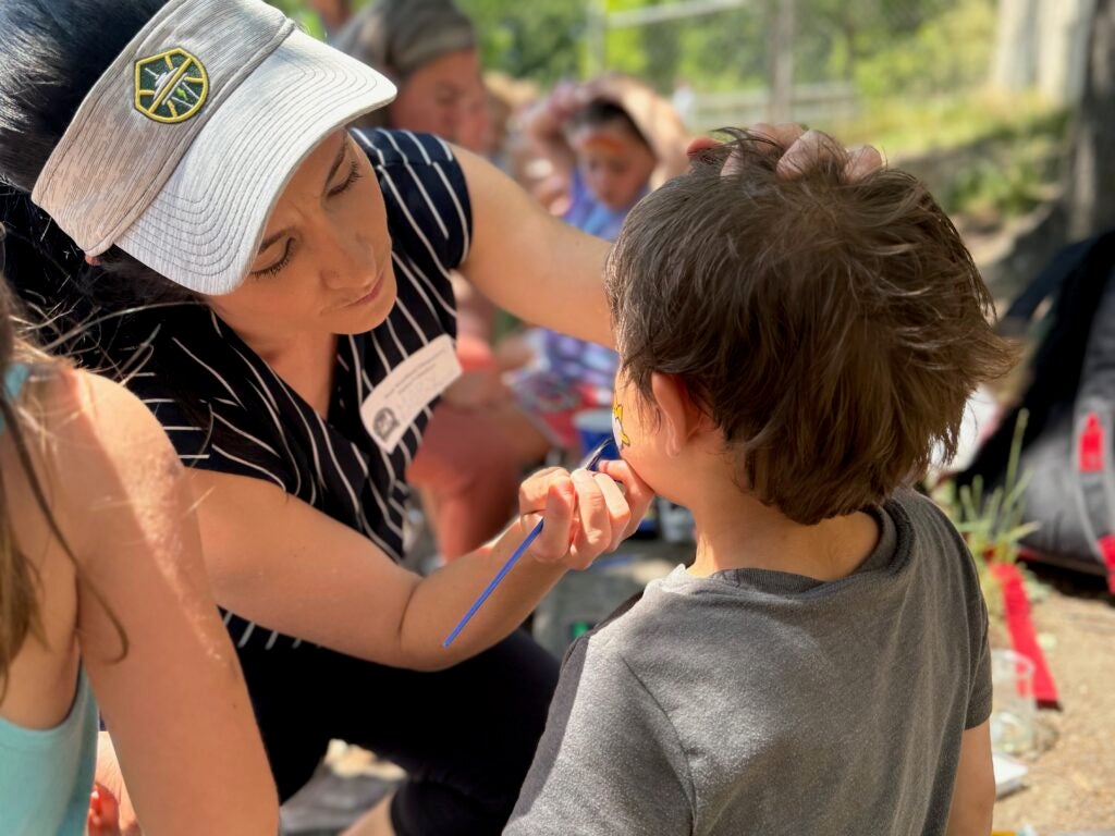 Parent volunteer face painting