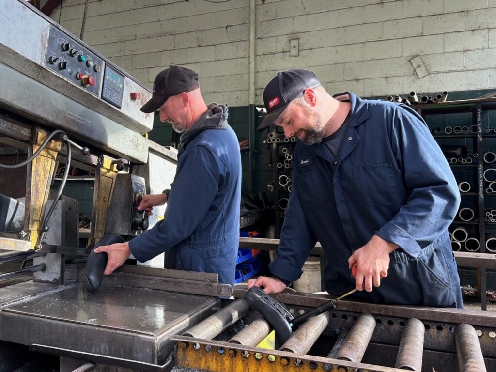 2 Metal Worker in workshop.