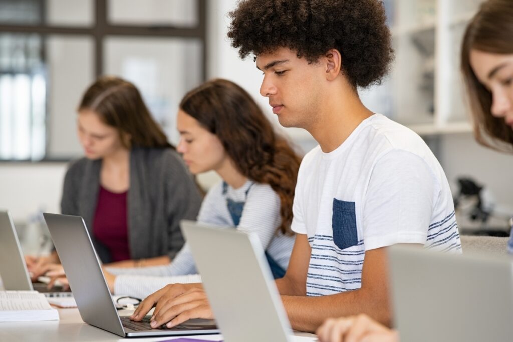 Students working on laptops.