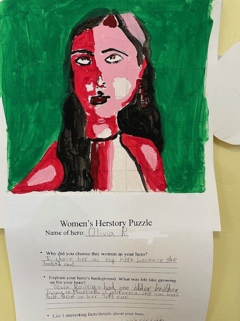 Herstory Puzzle Pieces Students chose a woman they admired to complete a portrait study and research template. Students practiced grid-drawing and monochromatic painting. Our influence artist was Amy Sherald.