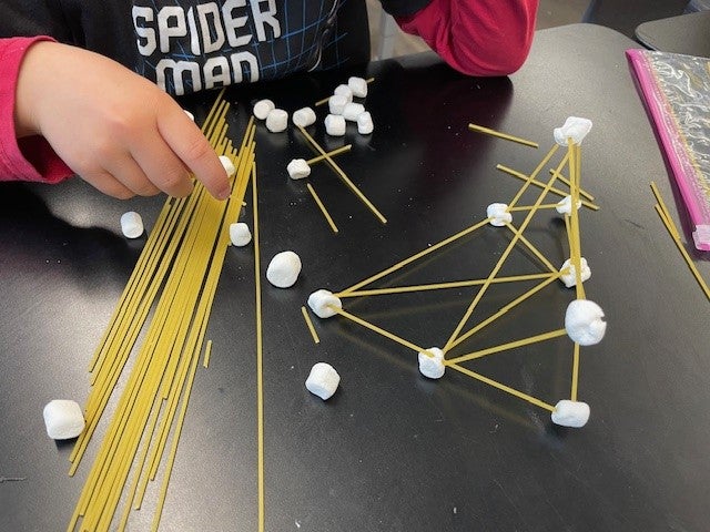 3D sculpture with spaghetti sticks and marshmallows.