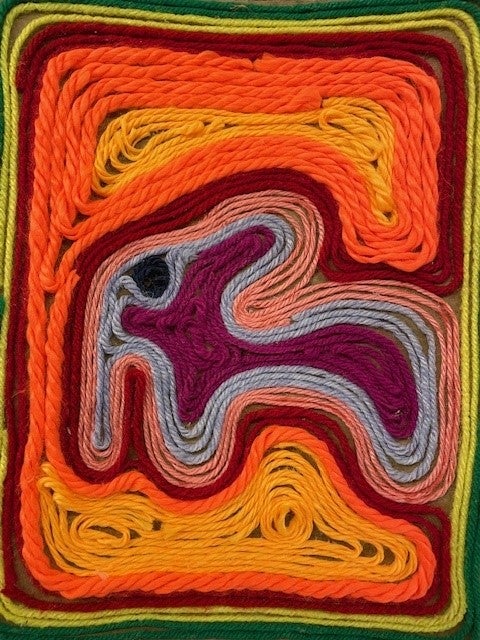Huichol Native Mexican yarn art Concentric image of elephant.