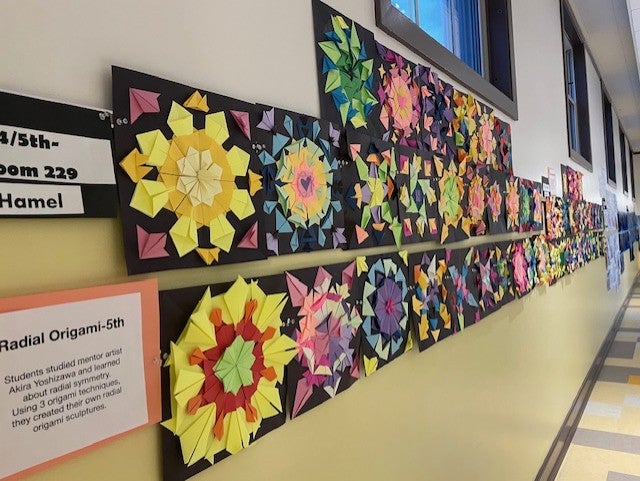 hallway view of origami symmetric folded paper