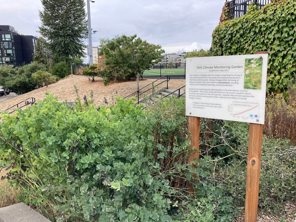 garden and a RHS Climate Monitoring Garden sign