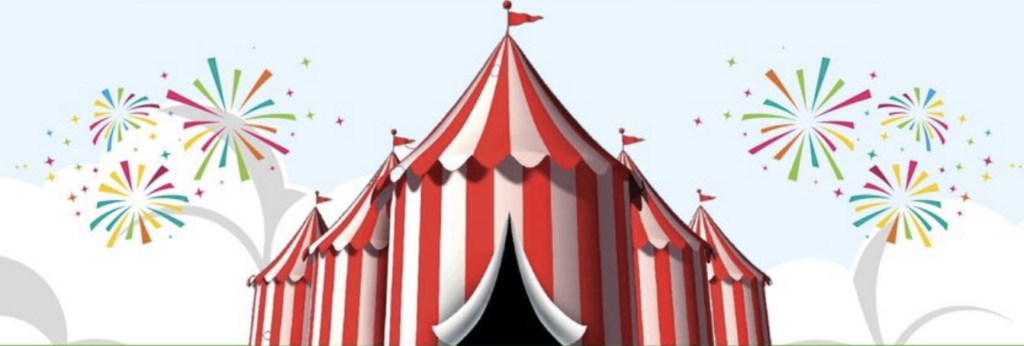 Stripped Carnival Tent with fireworks in the sky.