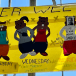 Beavers on a Banner with Days of the week.
