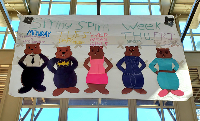 Beavers on a Banner in the Commons Area. Text: Mon, Tue, Wed, Thu, Fri