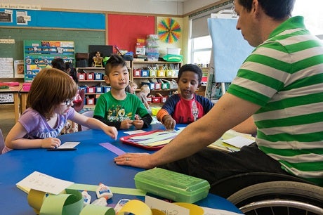 students and teacher in a classroom