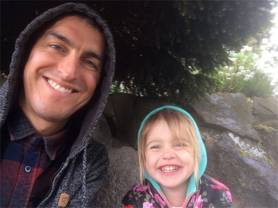 Photo of teacher dad and young daughter