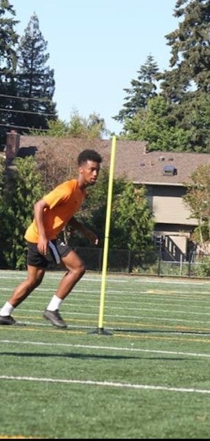 Photo of student playing soccer