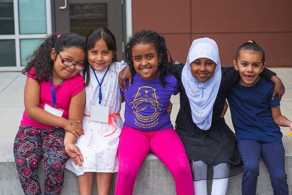 Students smile for a photo