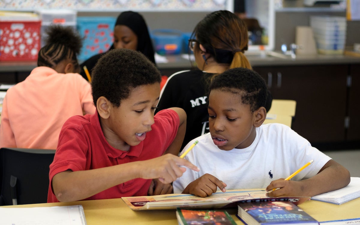 Two students reading