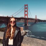 Image of Katie Cassidy in front of SF golden gate bridge