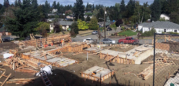 a construction site with wood frames around concrete