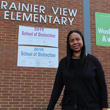 Anita Jones poses for a photo outside of Rainer View Elementary