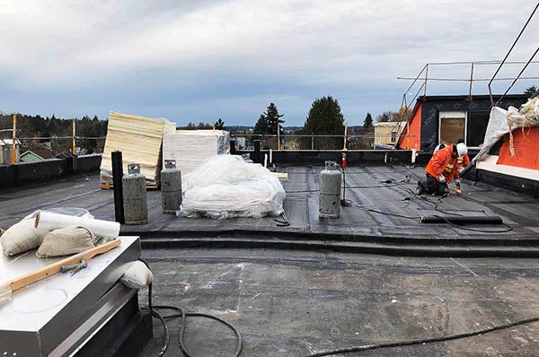 Adding roof drains and preparing for MDF paneling in the gym - Nov. 2021