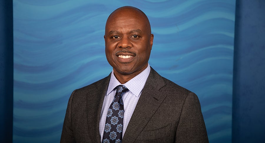Superintendent Jones smiles for a photo