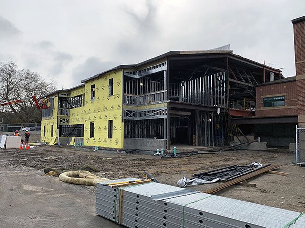 corner of a two story building under construction