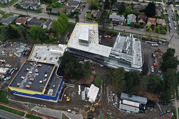A drone view of a large building under construction