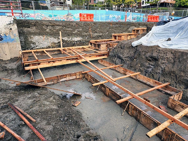 wood forms set into the ground