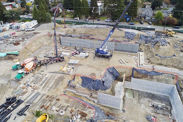 aerial view of a construction site with retaining walls