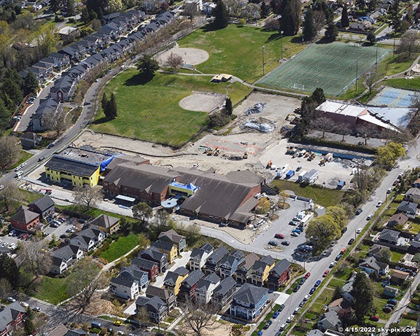 aerial photo of a construction project at one end of a building