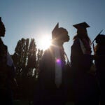 Rainier Beach graduation students in sillouette