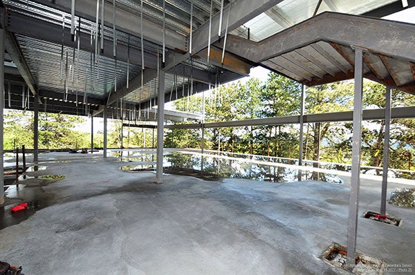 lower floor of a building under construction with a concrete floor