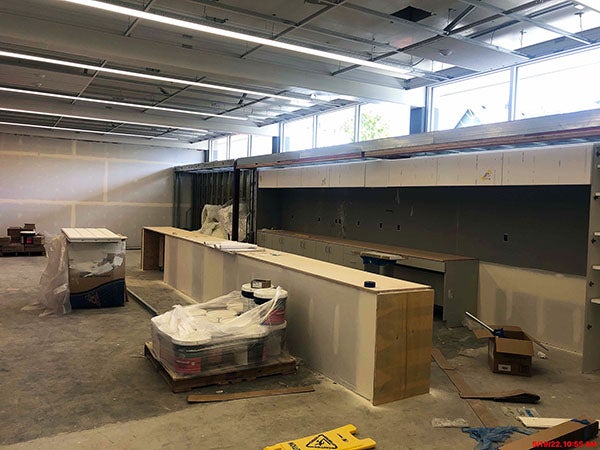 a room under construction with some cabinets