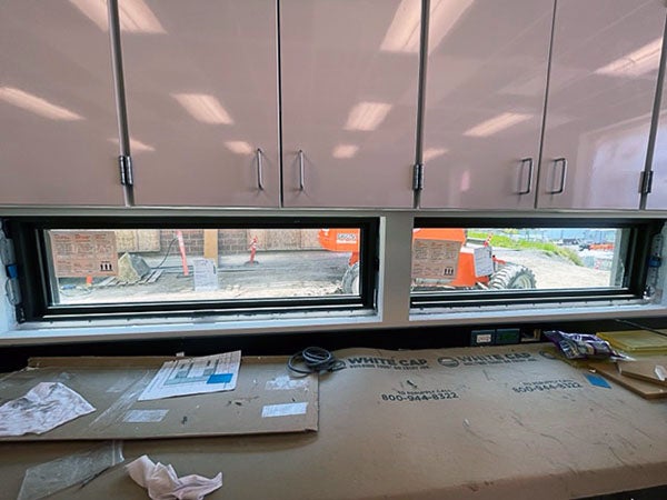 narrow horizonal windows under cabinets
