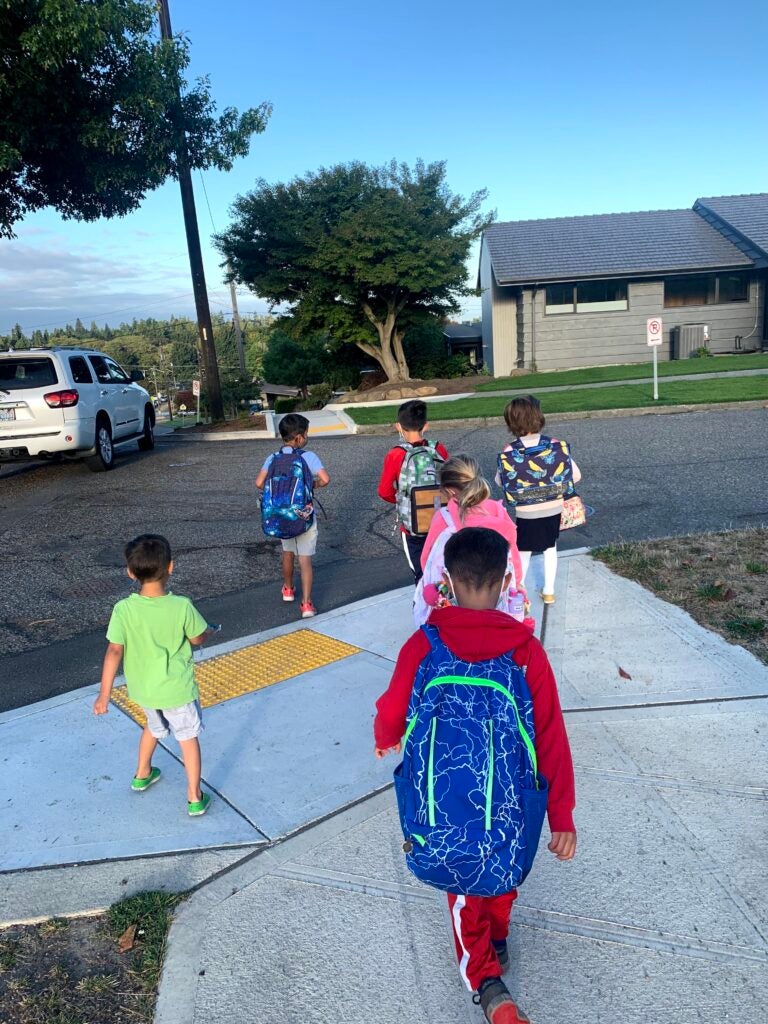 Group of students walking to North Beach Elementary