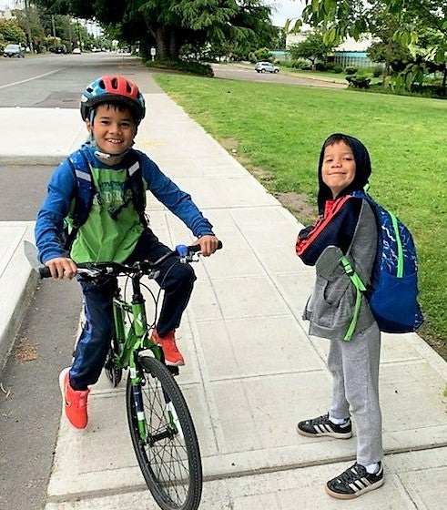 1st grader and 3rd grader walking and biking to school