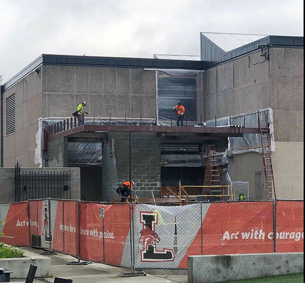 steel being installed in the outside corner of a building