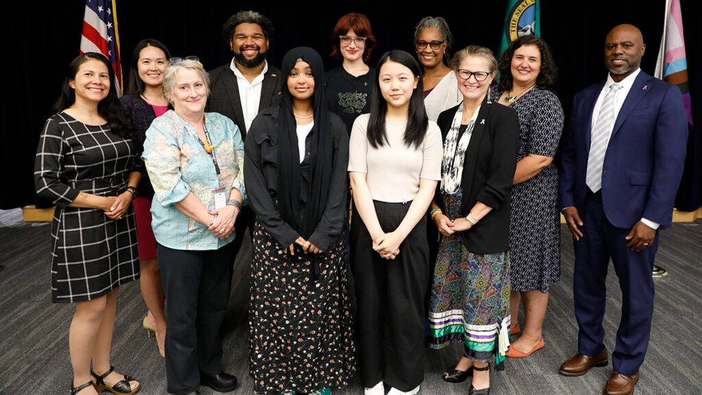 School Board with student members and superintendent