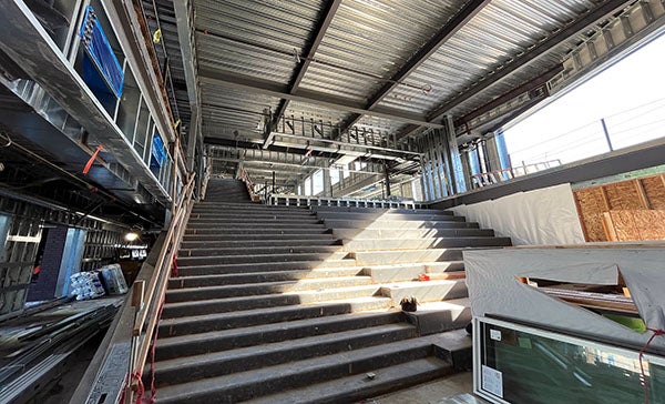 deep and normal concrete stairs next to each other in a building under construction
