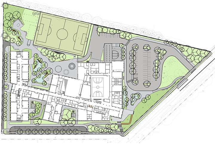 a drawing showing a school site with a building, parking, and green spaces