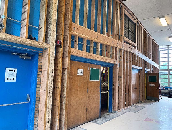 A wall with heavy wood framing