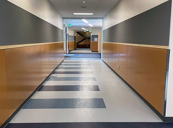 a hallway with open doors